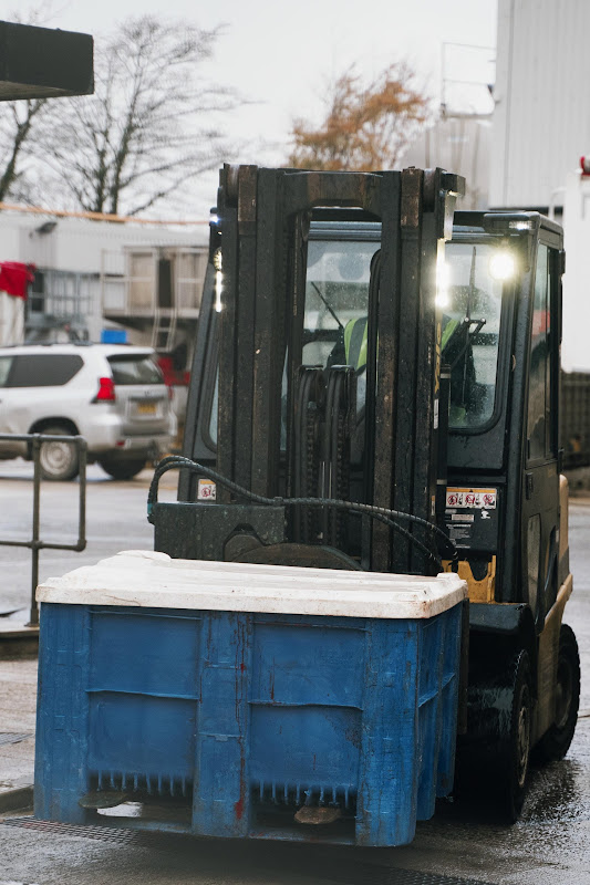 Forklift carrying entrails at St Merryn's Meat Slaughterhouse, Bodmin, Cornwall